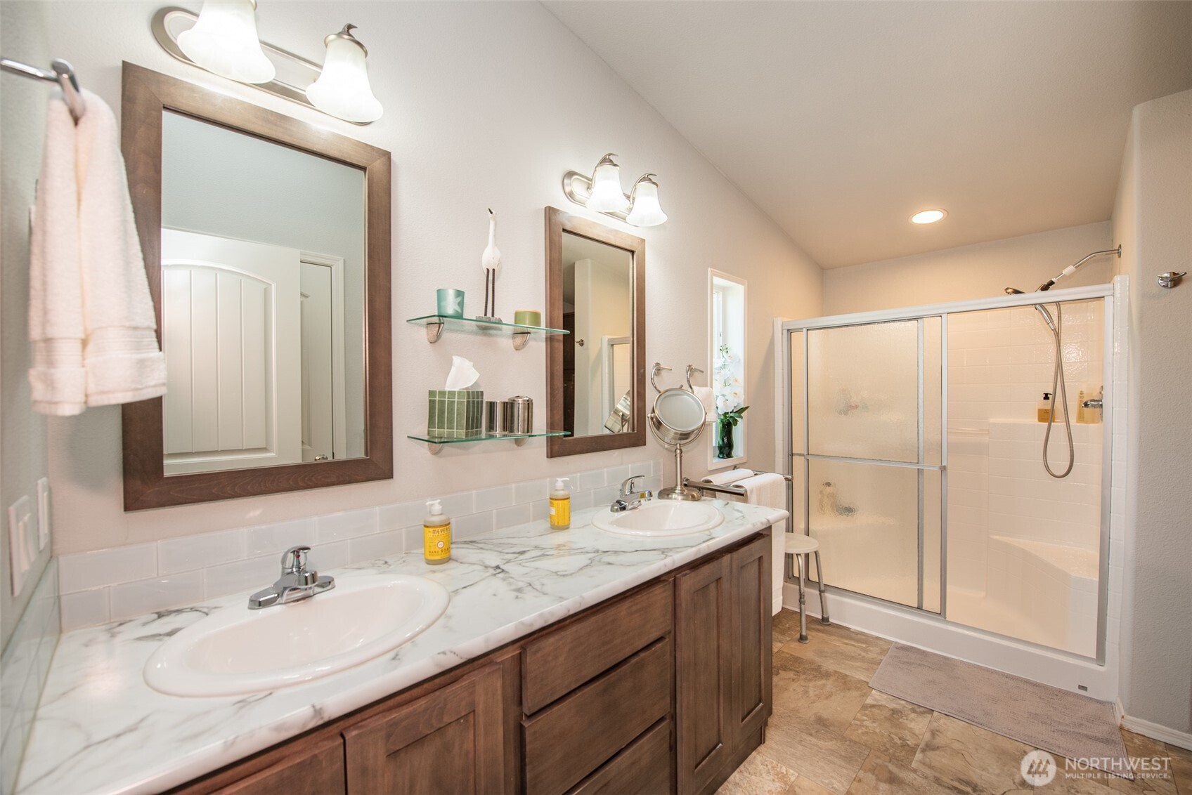 720 West Heritage Loop Sequim, WA 98382 - Photo 21 of 35 a bathroom with a double vanity sink mirror and double