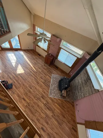 a view of entryway with wooden floor