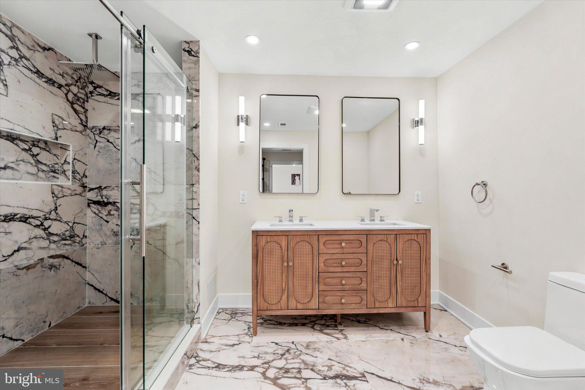 1919 Cobden Road Glenside, PA 19038 - Photo 19 of 35 Elegant marble-clad modern bathroom.