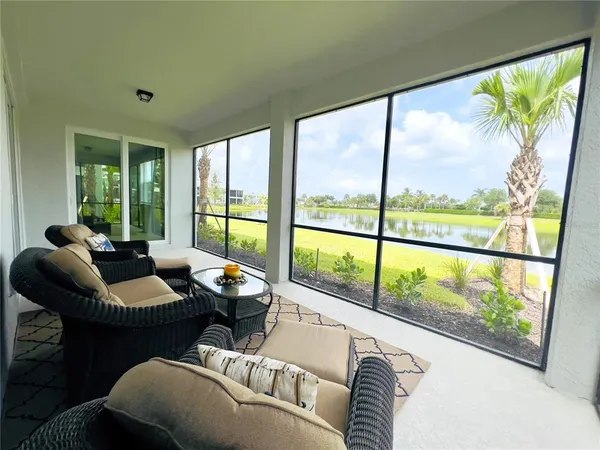 a view of a lake with a big yard