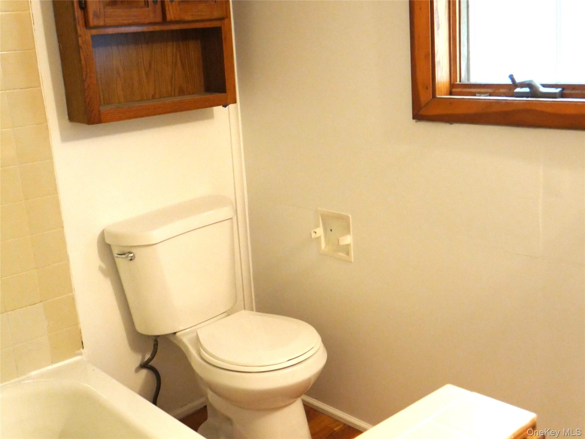 35 Fallkill Avenue Poughkeepsie, NY 12601 - Photo 16 of 27 a bathroom with a toilet and a sink