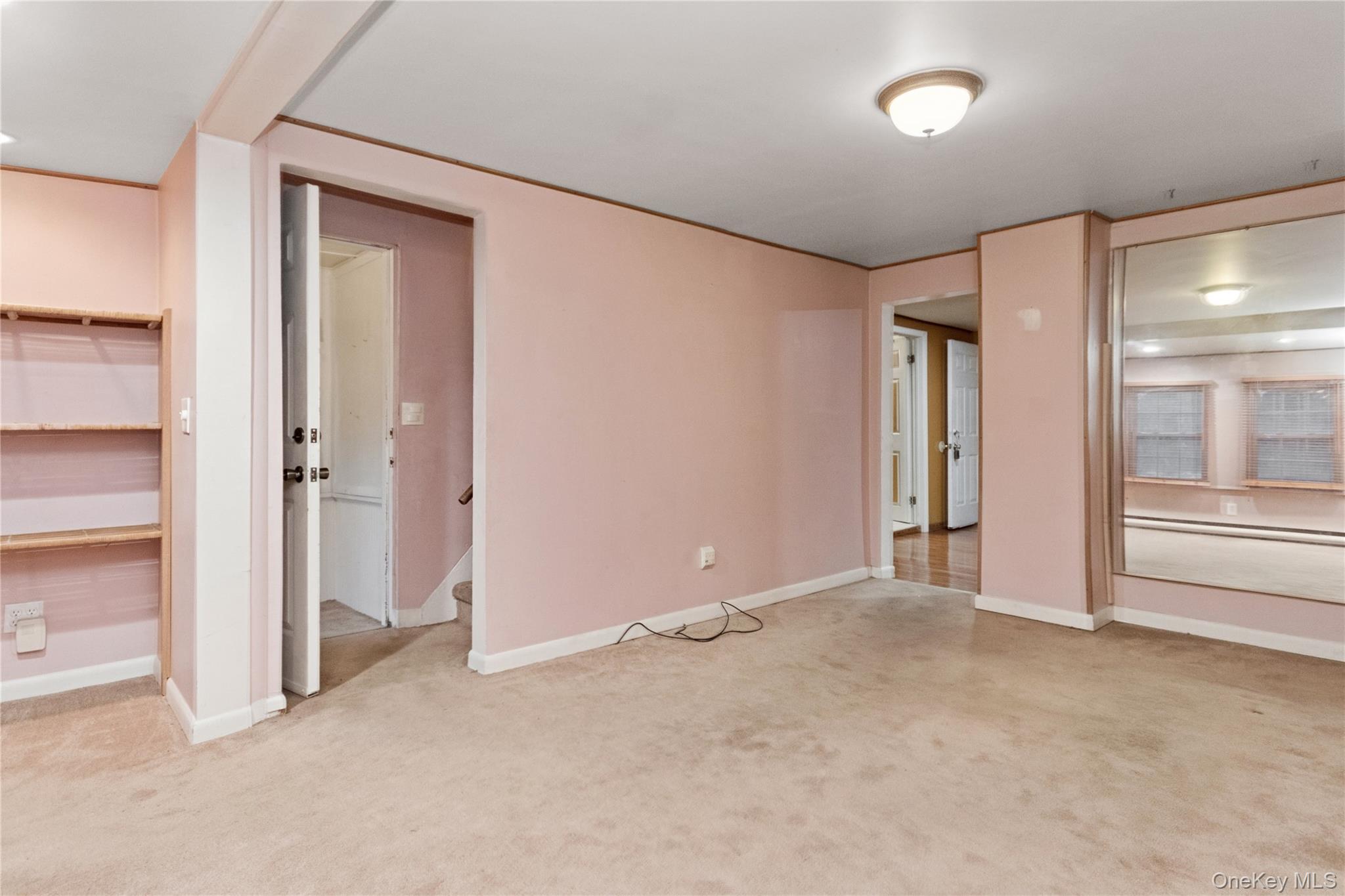 35 Fallkill Avenue Poughkeepsie, NY 12601 - Photo 19 of 27 an empty room with closet and a fireplace