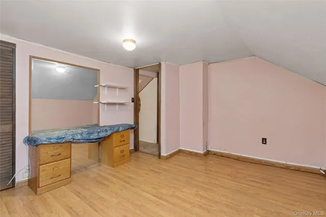a view of a kitchen with granite countertop cabinets