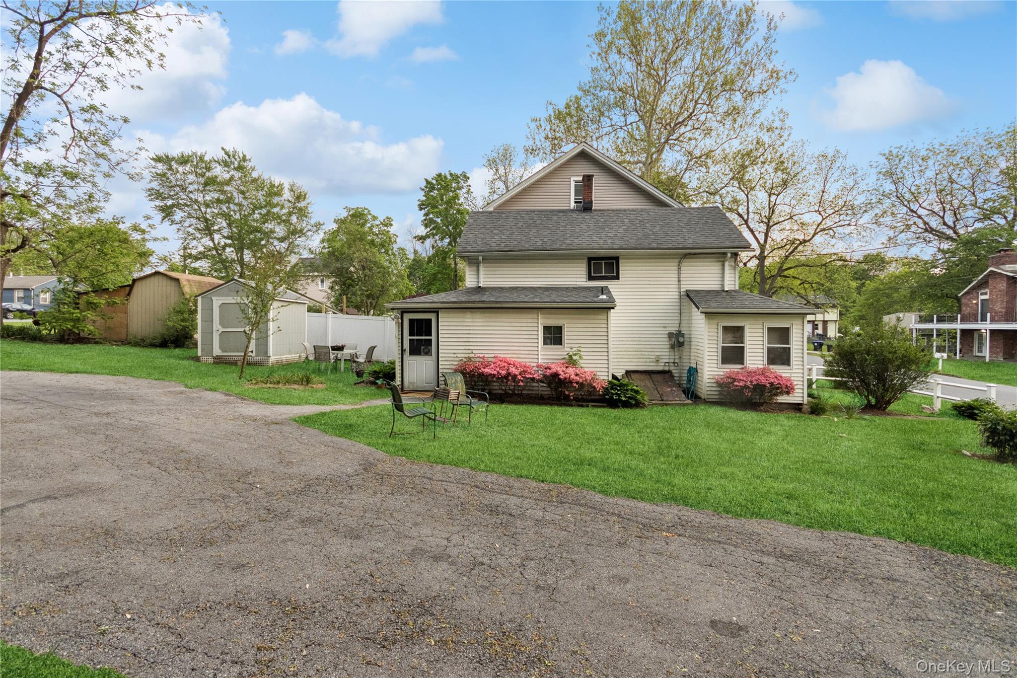 35 Fallkill Avenue Poughkeepsie, NY 12601 - Photo 2 of 27 a front view of a house with a yard and garage