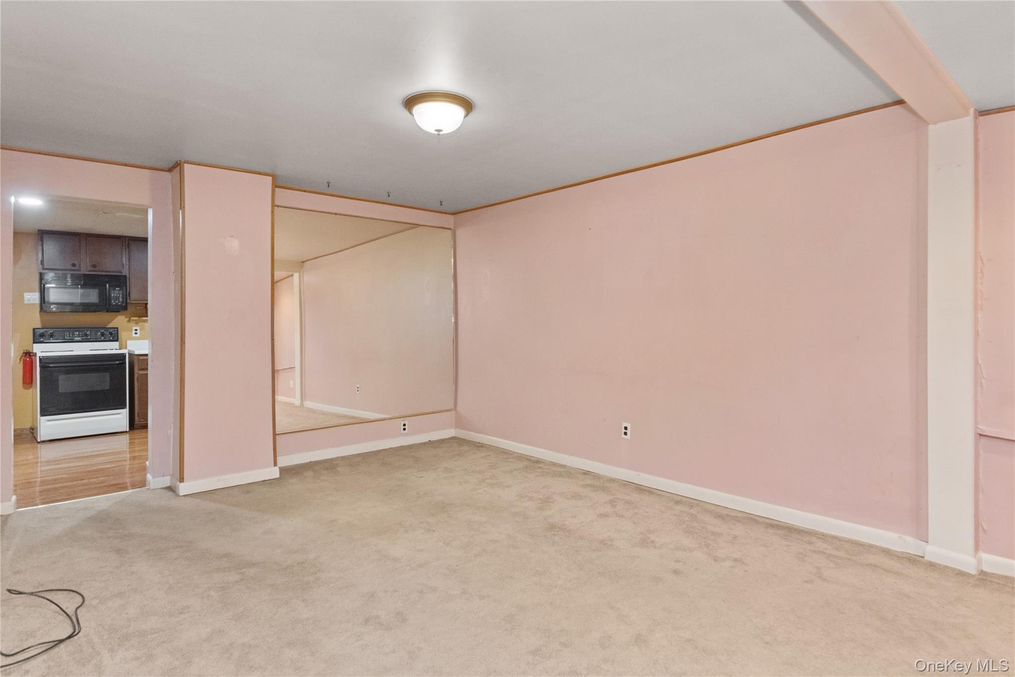 35 Fallkill Avenue Poughkeepsie, NY 12601 - Photo 26 of 27 an empty room with kitchen view
