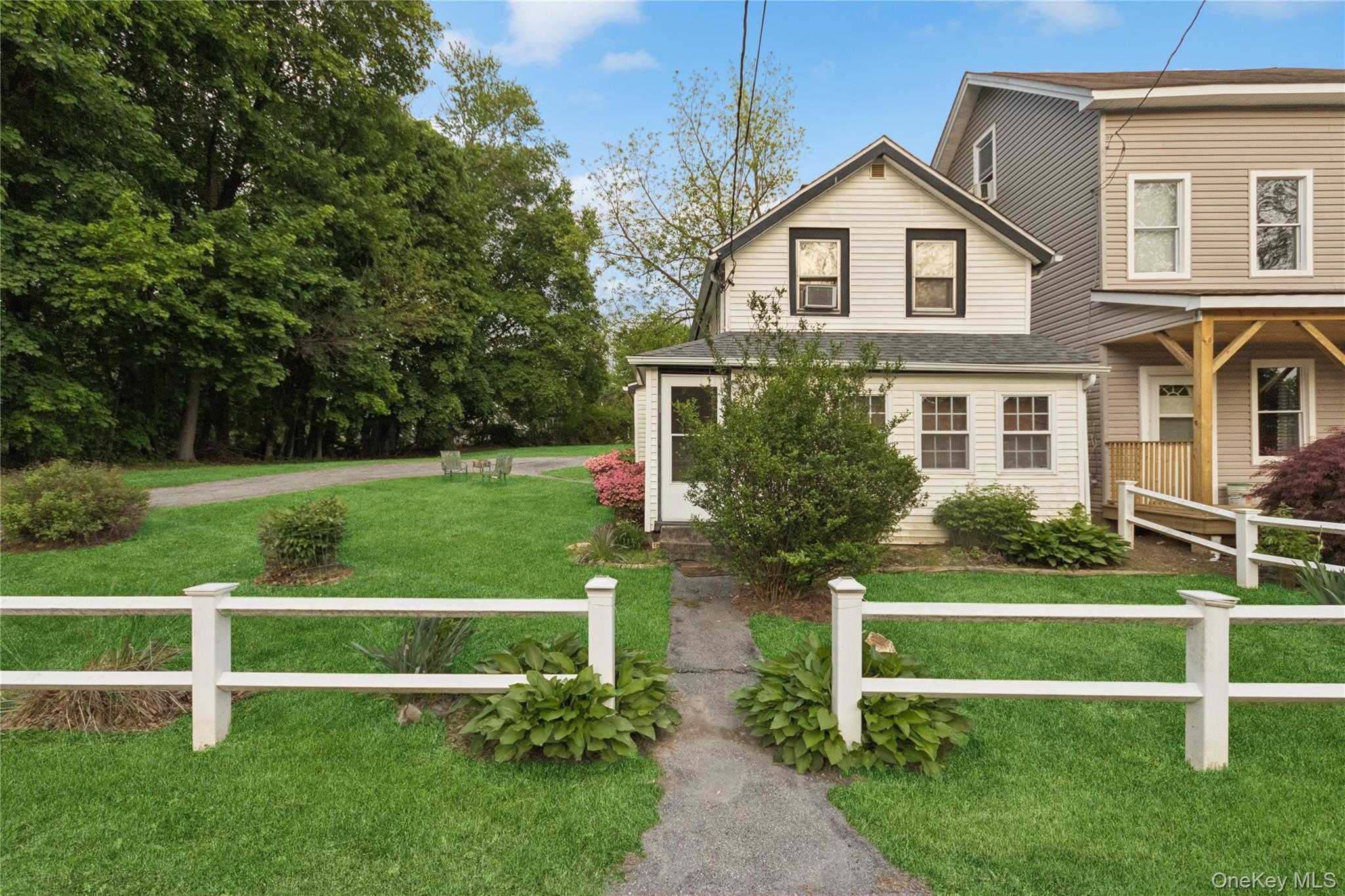 35 Fallkill Avenue Poughkeepsie, NY 12601 - Photo 4 of 27 a front view of a house with a yard and green space