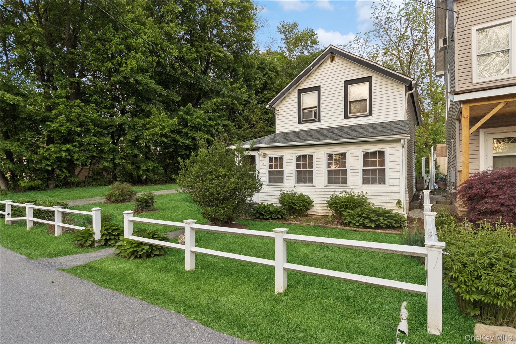 35 Fallkill Avenue Poughkeepsie, NY 12601 - Photo 5 of 27 a front view of a house with a yard