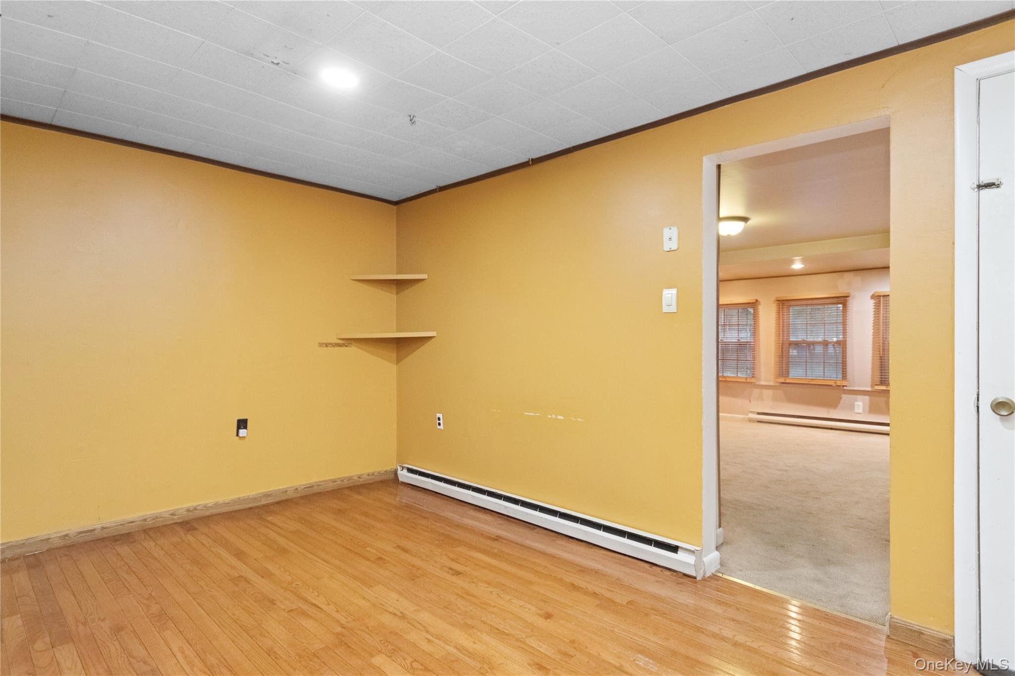 35 Fallkill Avenue Poughkeepsie, NY 12601 - Photo 10 of 27 wooden floor in an empty room