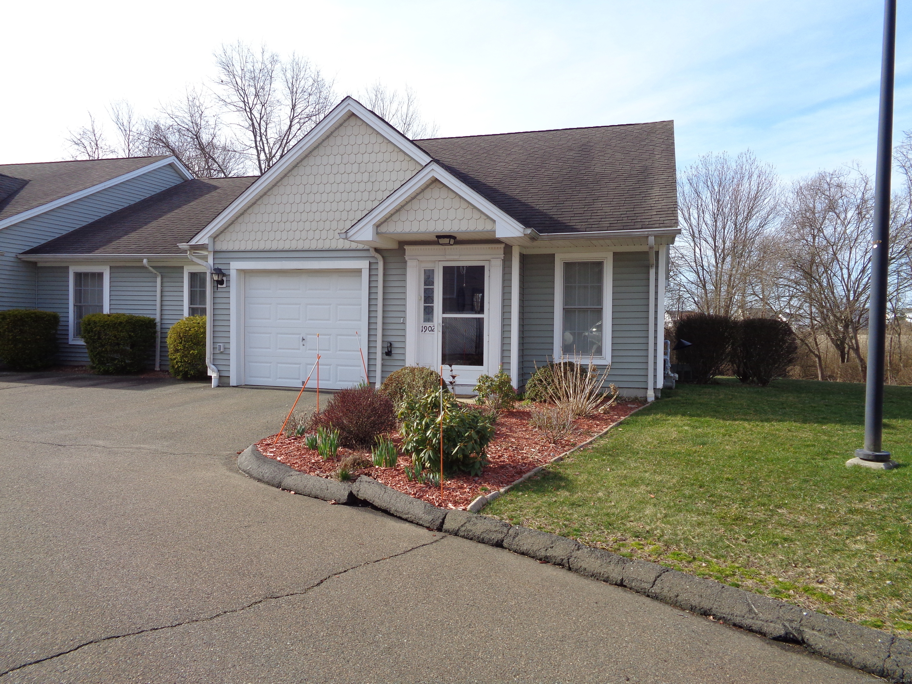 560 Silver Sands Road, Unit 1902 East Haven, CT 06512 - Photo 1 of 1 Front entrance with garage to left.