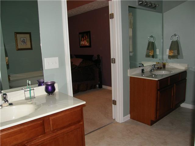 2038 Fiona Way Spring Hill, TN 37174 - Photo 9 of 20 Master Bathroom has a large soaking tub, separate shower, private commode area, dual vanities and a HUGE master closet.