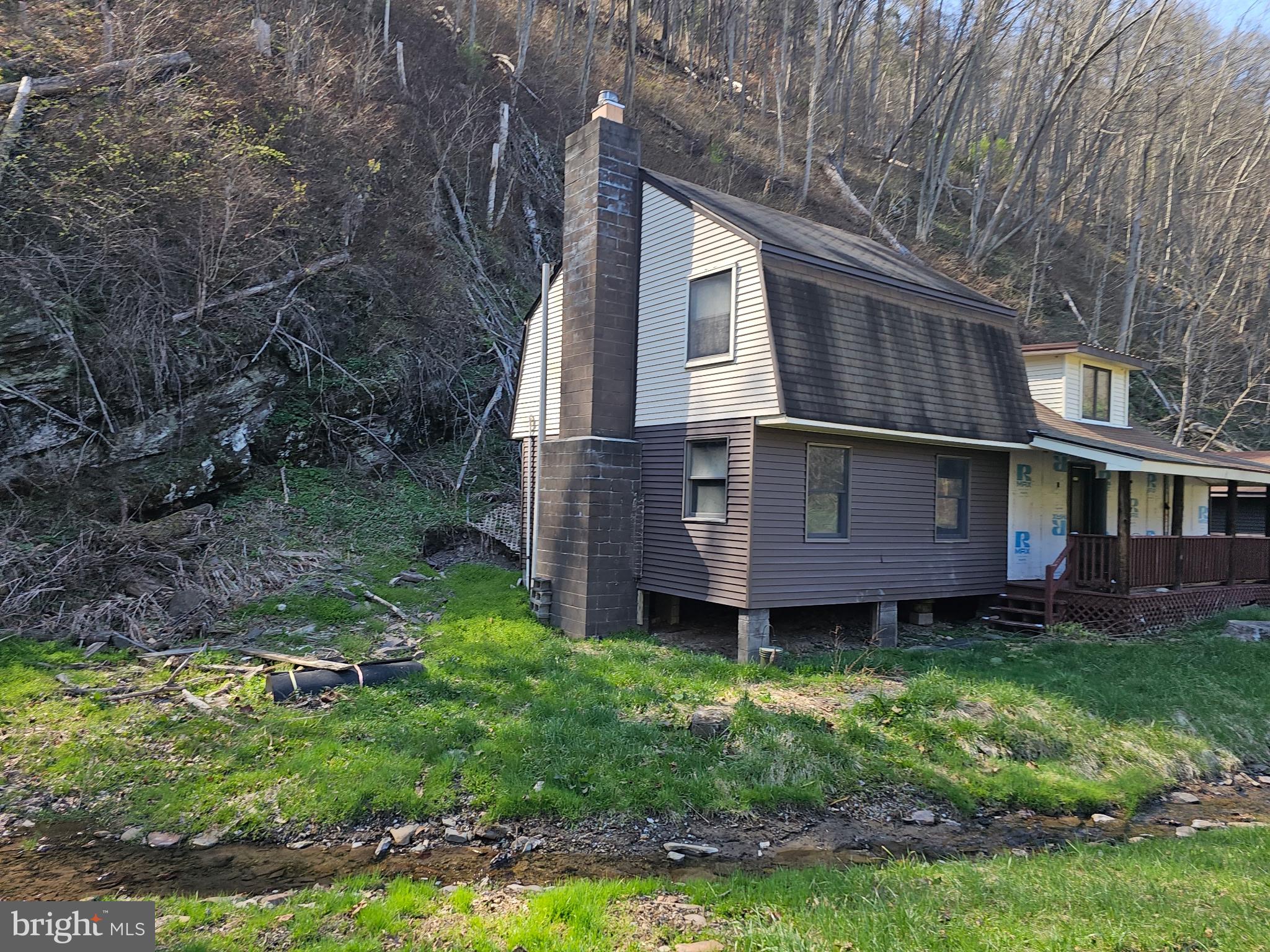 13037 Savage River Road Swanton, MD 21561 - Photo 2 of 8 a view of a house with a yard