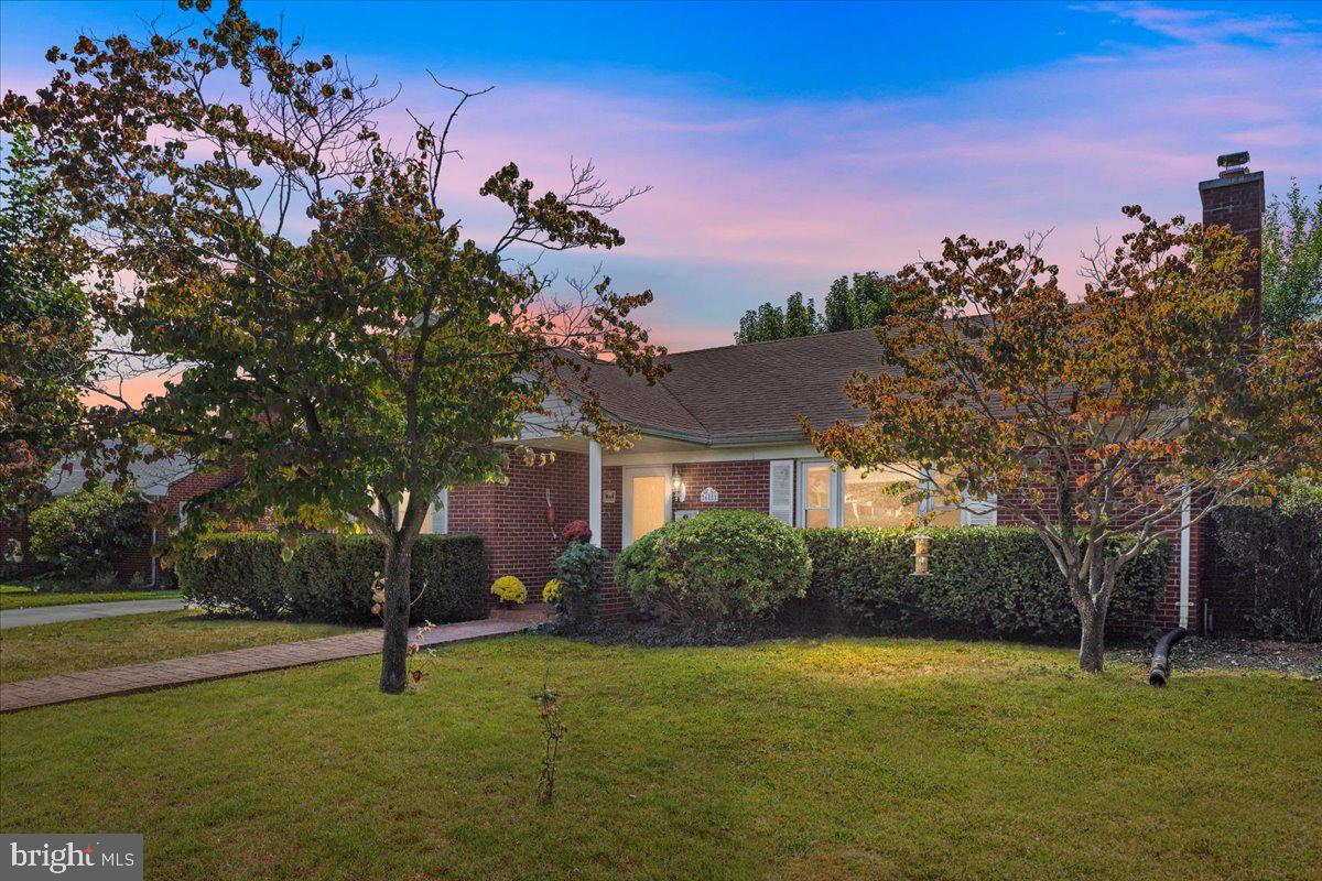 605 Happy Creek Road Front Royal, VA 22630 - Photo 2 of 19 a house with garden in front of it