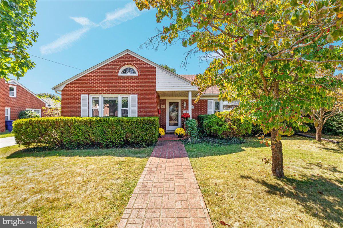 605 Happy Creek Road Front Royal, VA 22630 - Photo 3 of 19 a front view of a house with a yard and trees