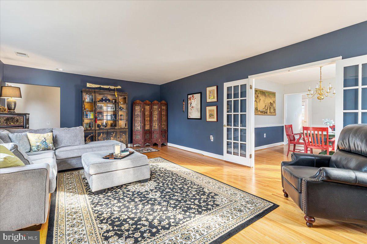 605 Happy Creek Road Front Royal, VA 22630 - Photo 6 of 19 a living room with furniture and wooden floor