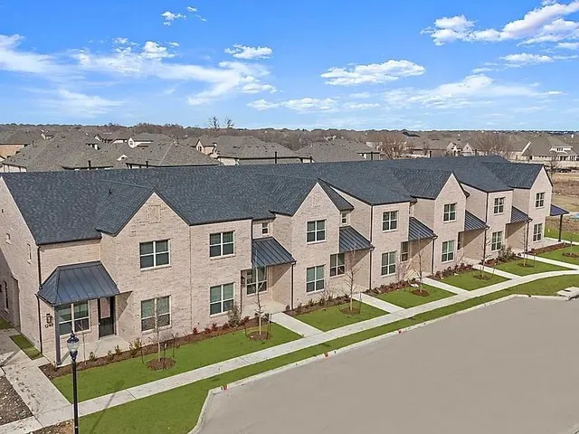 a view of a city with tall buildings