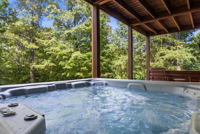 a open kitchen with stainless steel appliances granite countertop a stove and cabinets