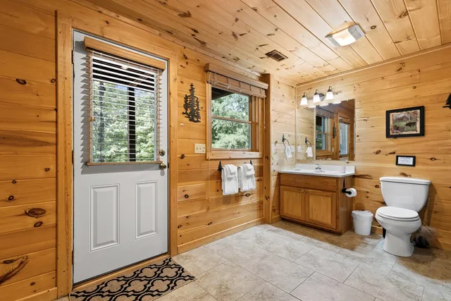 a view of a lake with a sitting area