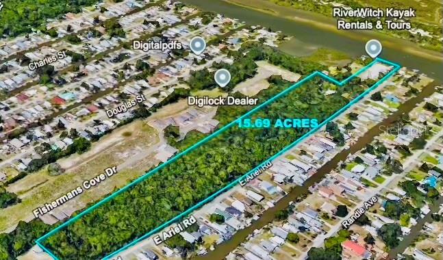 251 Bissit Bay Road Oak Hill, FL 32759 - Photo 7 of 9 an aerial view of a city