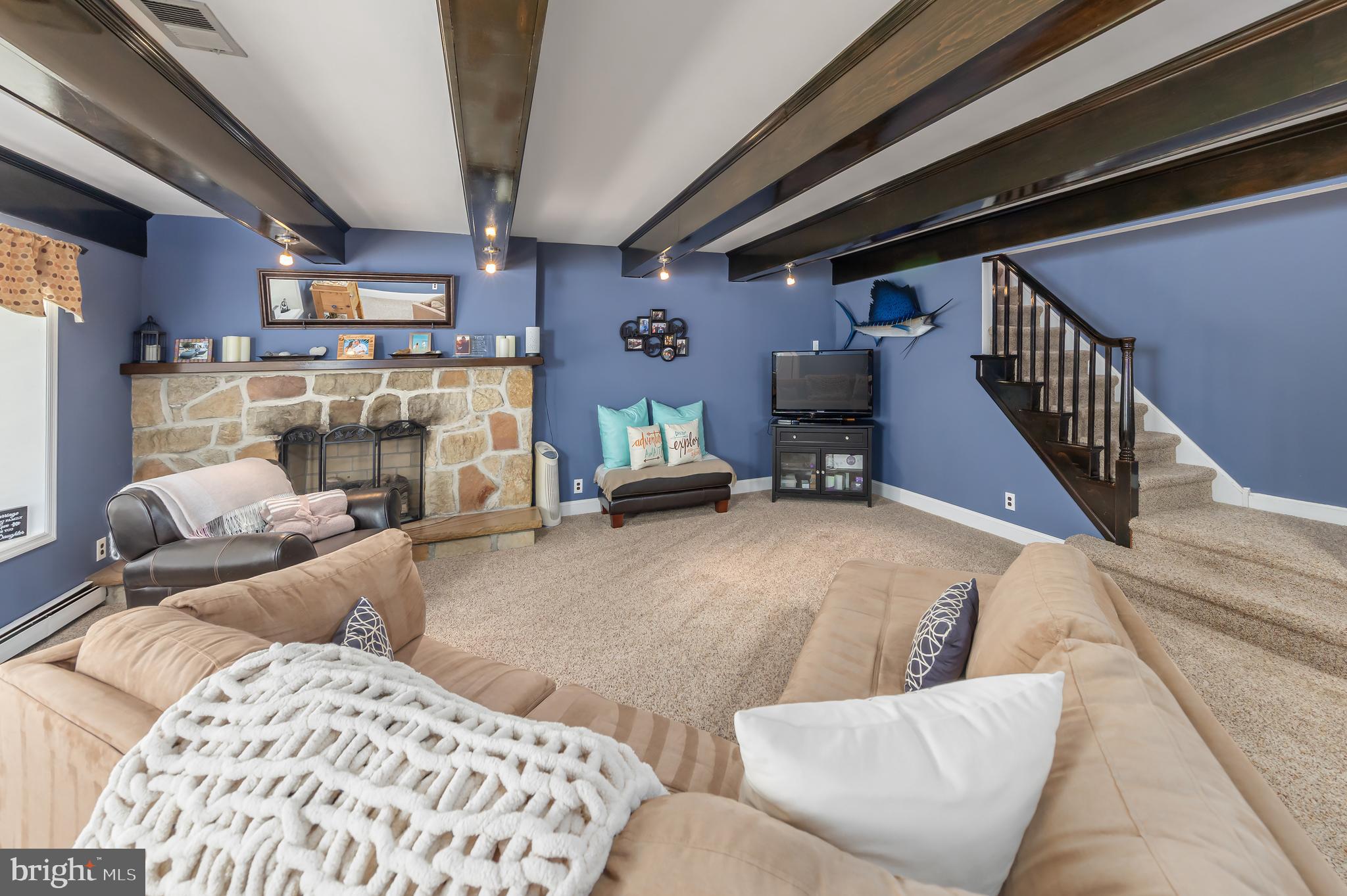 303 Main Street Mantua, NJ 08051 - Photo 12 of 48 a living room with furniture and a chandelier