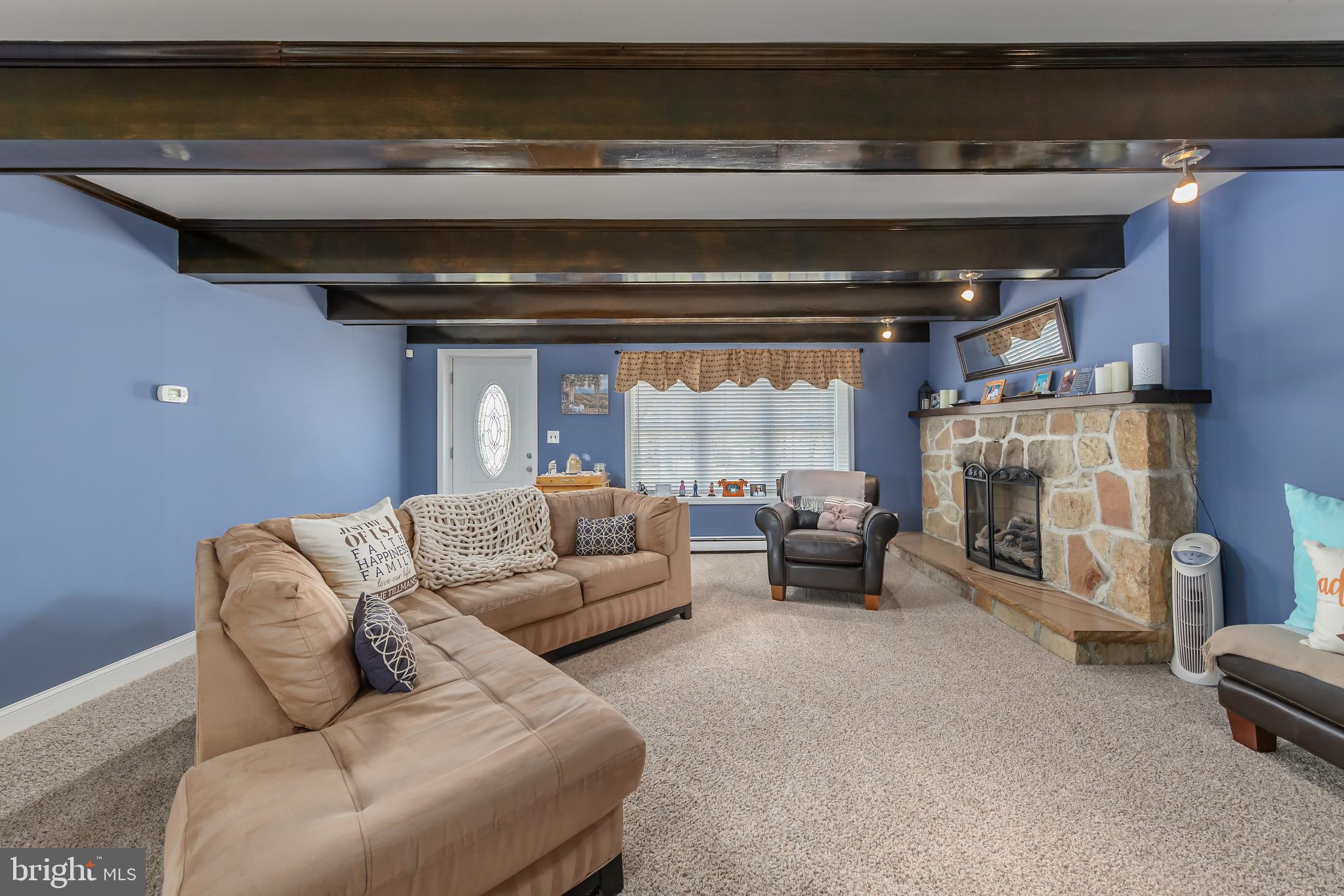 303 Main Street Mantua, NJ 08051 - Photo 13 of 48 a living room with furniture and a fireplace