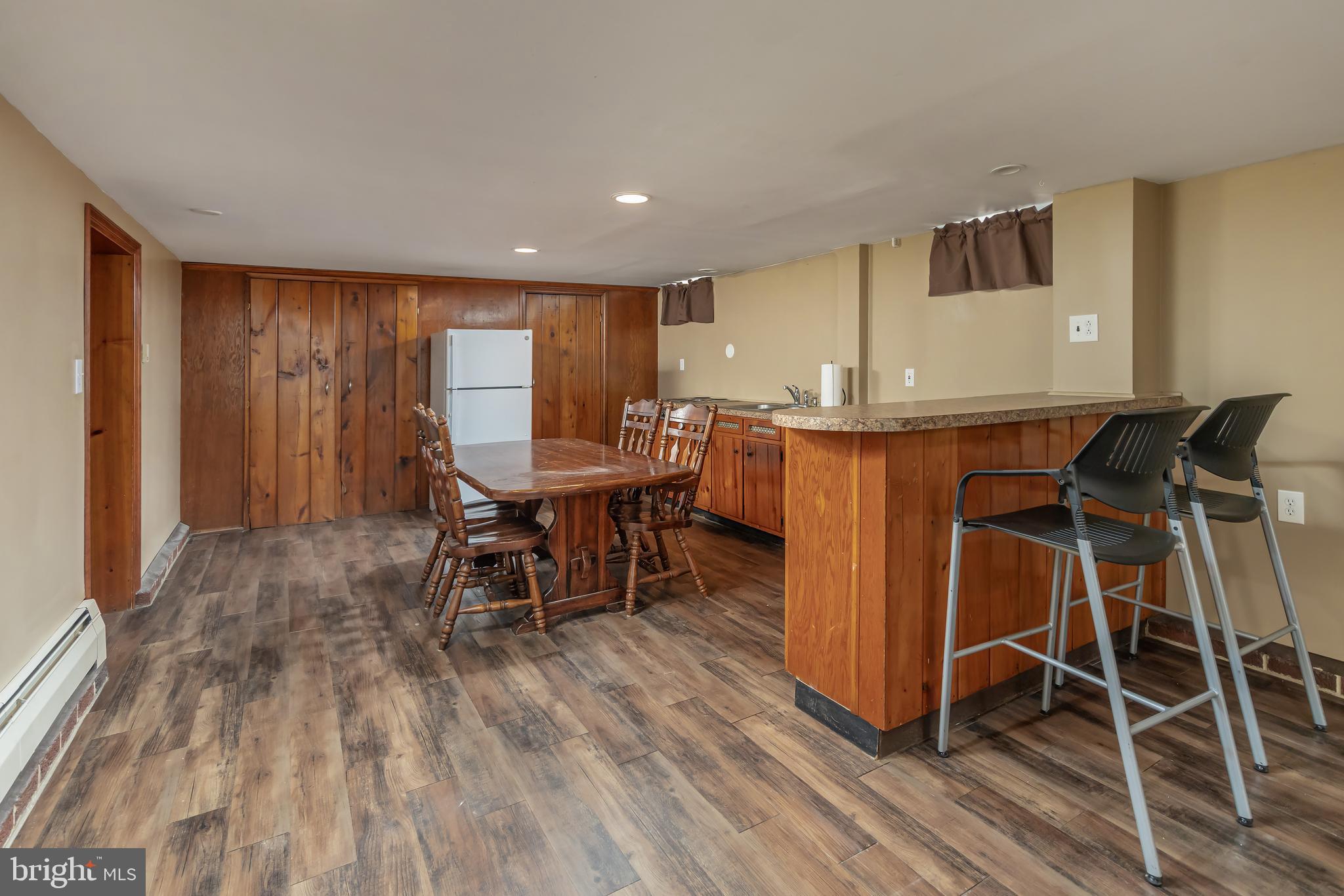 303 Main Street Mantua, NJ 08051 - Photo 24 of 48 a dining room with furniture and wooden floor