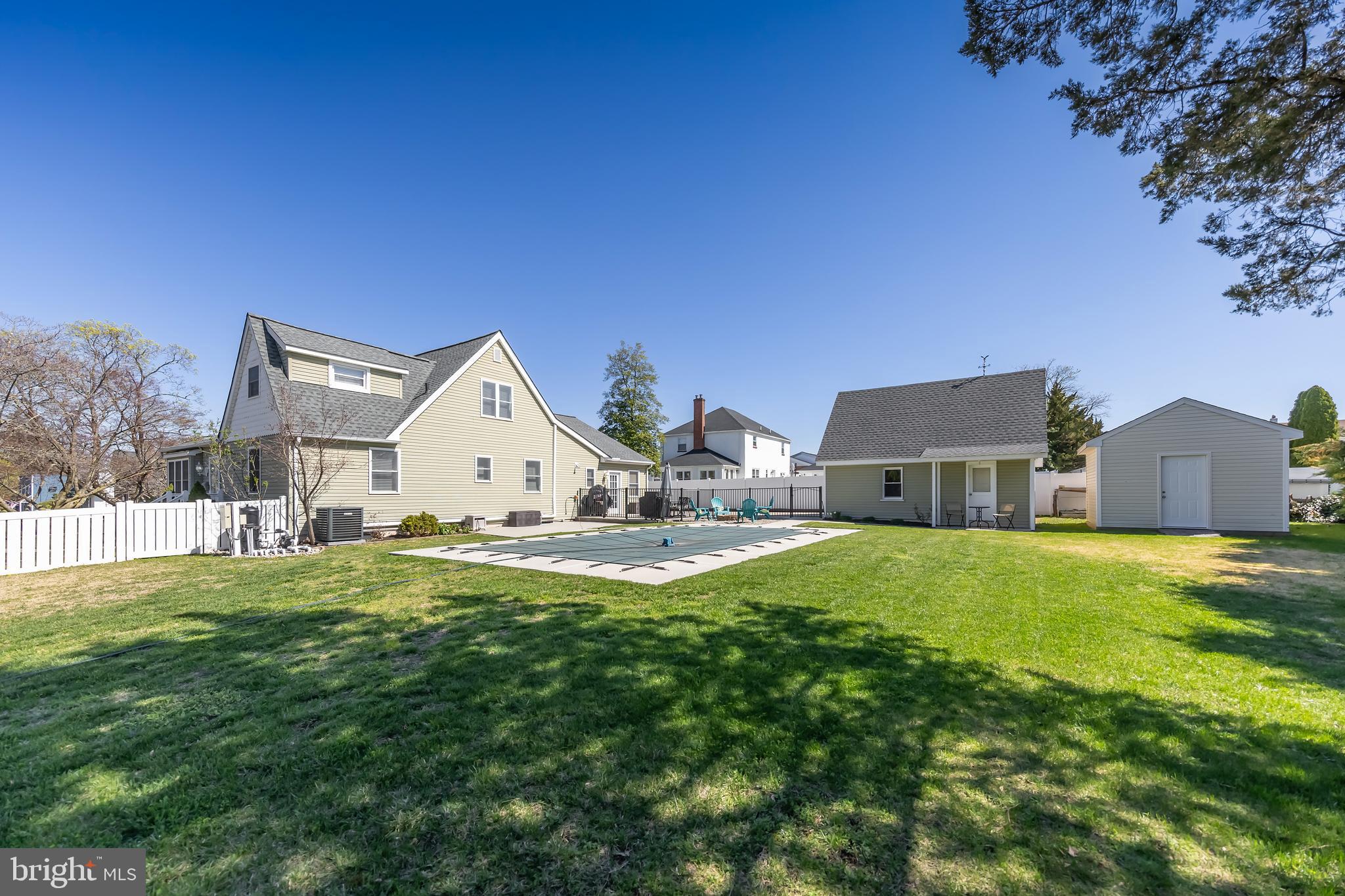 303 Main Street Mantua, NJ 08051 - Photo 31 of 48 a view of a house with a big yard and large trees