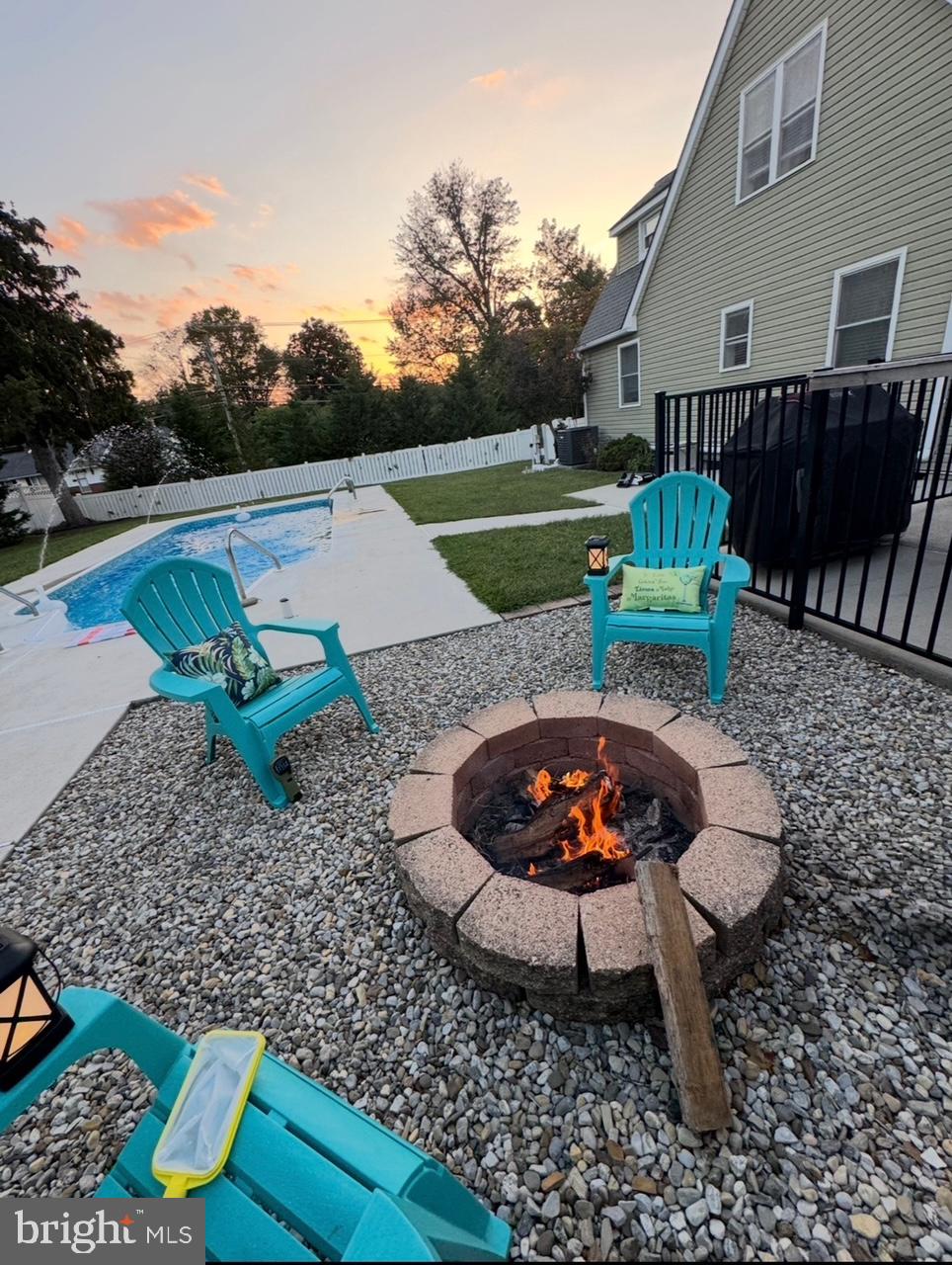 303 Main Street Mantua, NJ 08051 - Photo 34 of 48 a backyard of a house with yard fire pit and outdoor seating