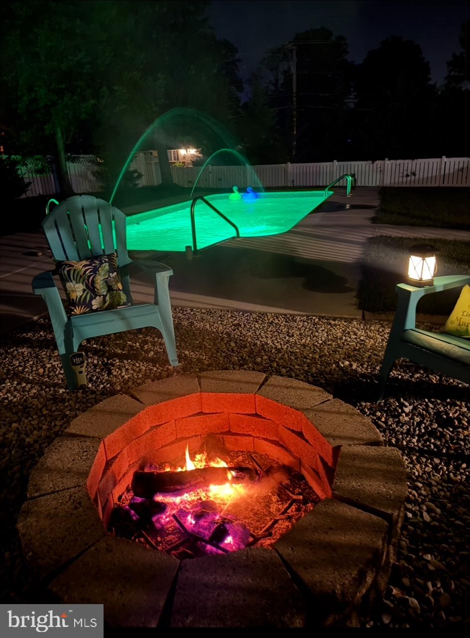 303 Main Street Mantua, NJ 08051 - Photo 36 of 48 a view of yard with swimming pool and outdoor seating