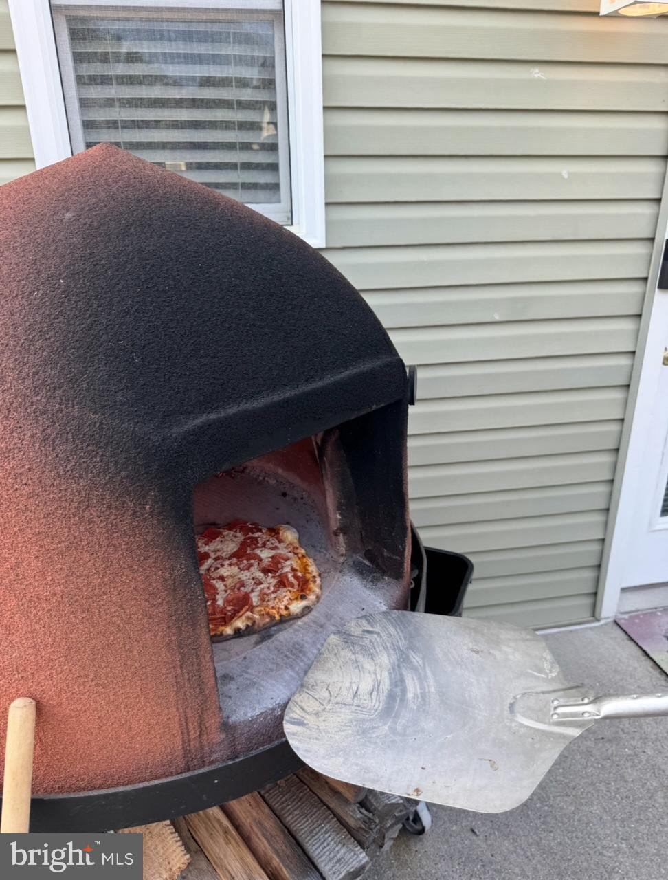 303 Main Street Mantua, NJ 08051 - Photo 42 of 48 a vase of flowers sitting on a table