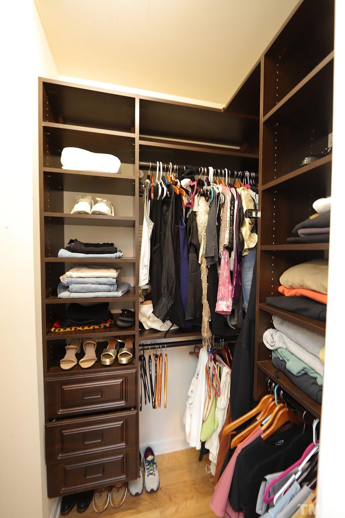 3715 Bellevue Road Raleigh, NC 27609 - Photo 4 of 15 a view of walk in closet with clothes and shoes
