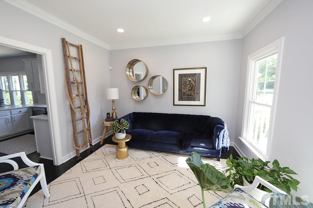 3715 Bellevue Road Raleigh, NC 27609 - Photo 7 of 15 a living room with furniture and a window