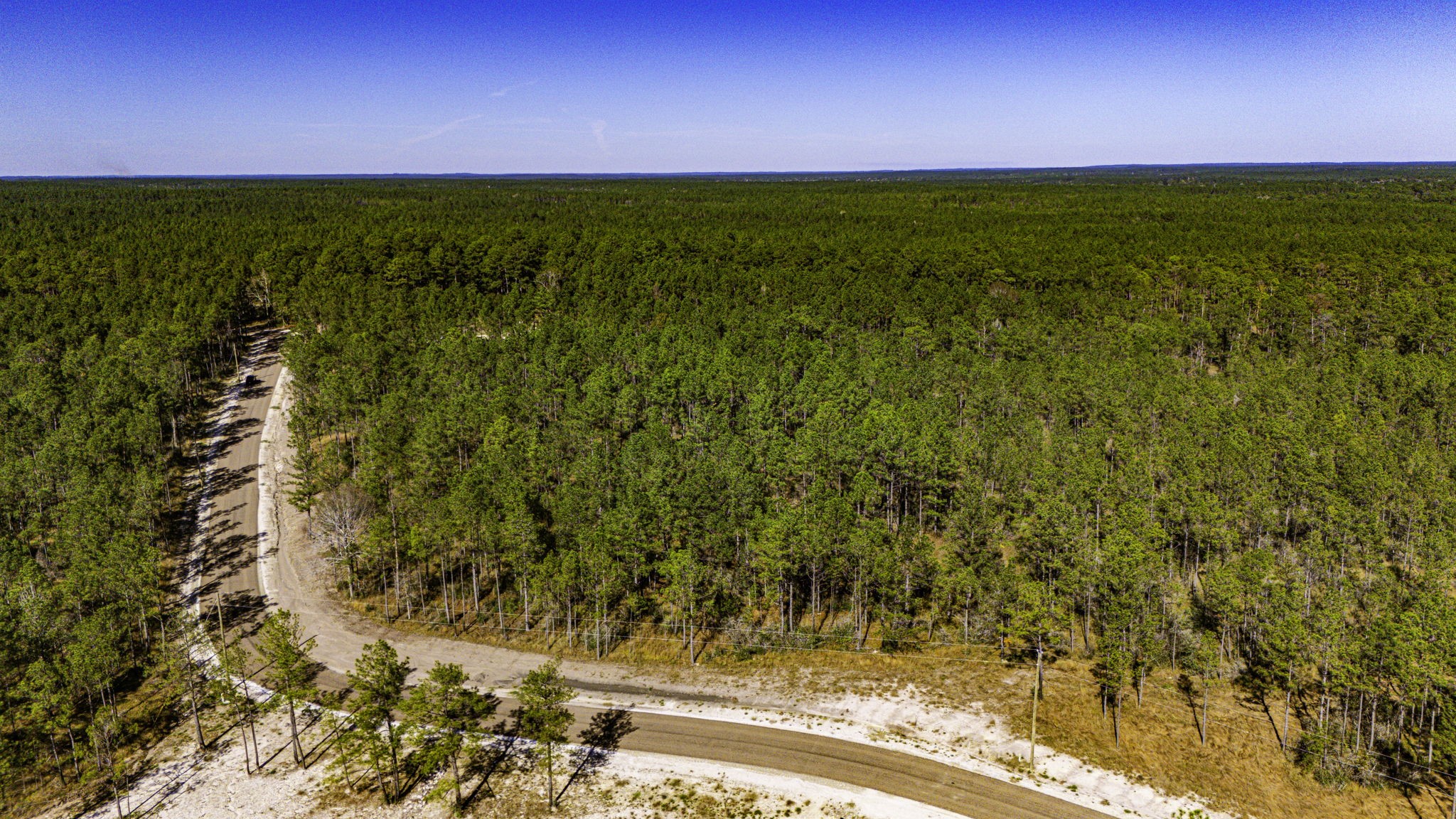 312 King Ranch Road South Onalaska, TX 77360 - Photo 5 of 10 a view of an ocean from a yard