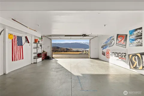 a bedroom with a bed and glass window