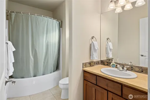 a view of a balcony with chair and city view