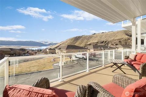 a view of a balcony with an ocean view