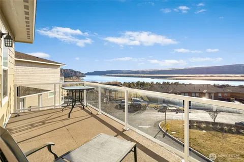 a view of a terrace with chairs