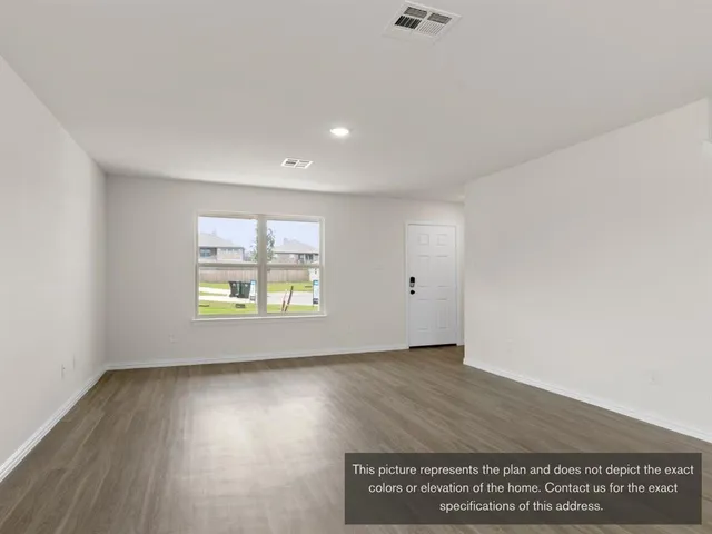 a view of kitchen with wooden floor