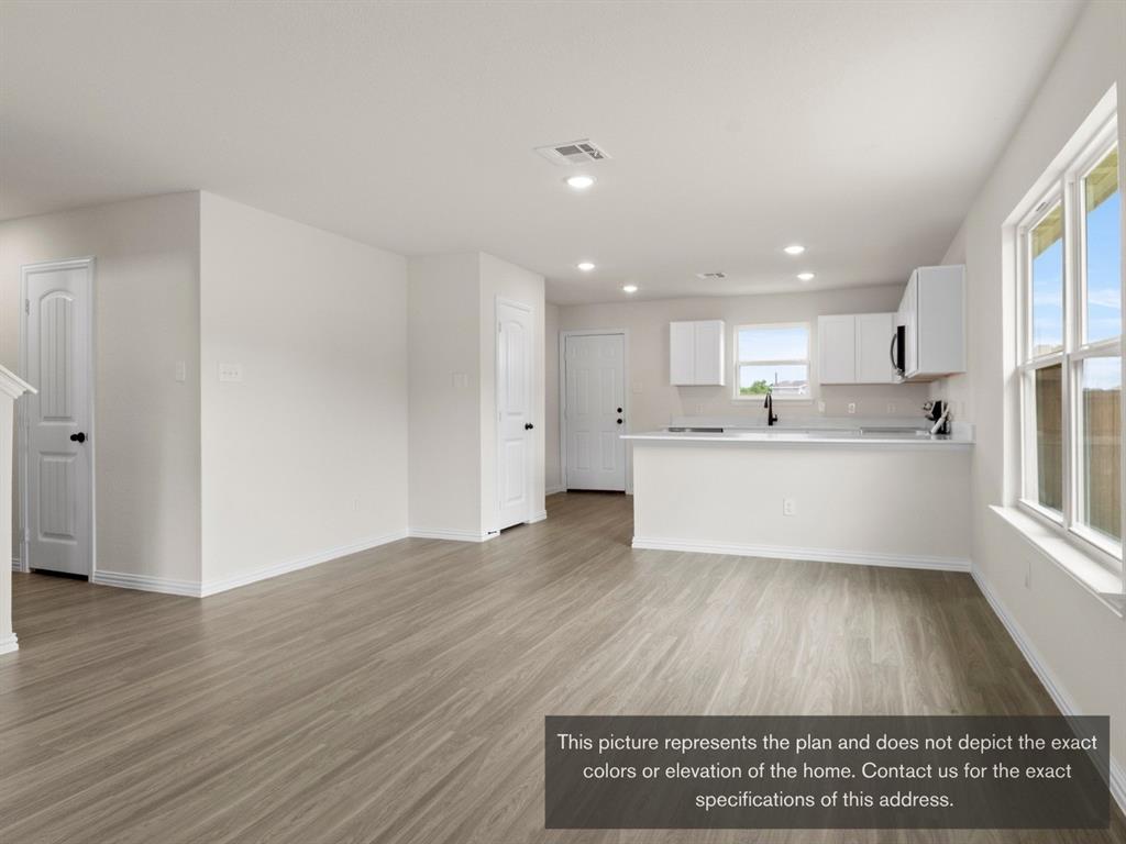 1809 Zelvia Lane Waco, TX 76708 - Photo 6 of 26 a view of kitchen with wooden floor