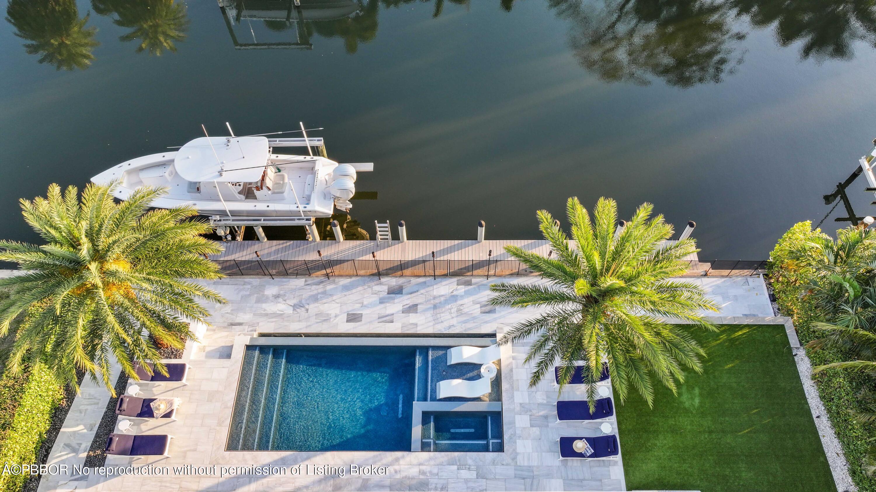 624 Pilot Road North Palm Beach, FL 33408 - Photo 21 of 53 Aerial Pool Lawn Boat Lift