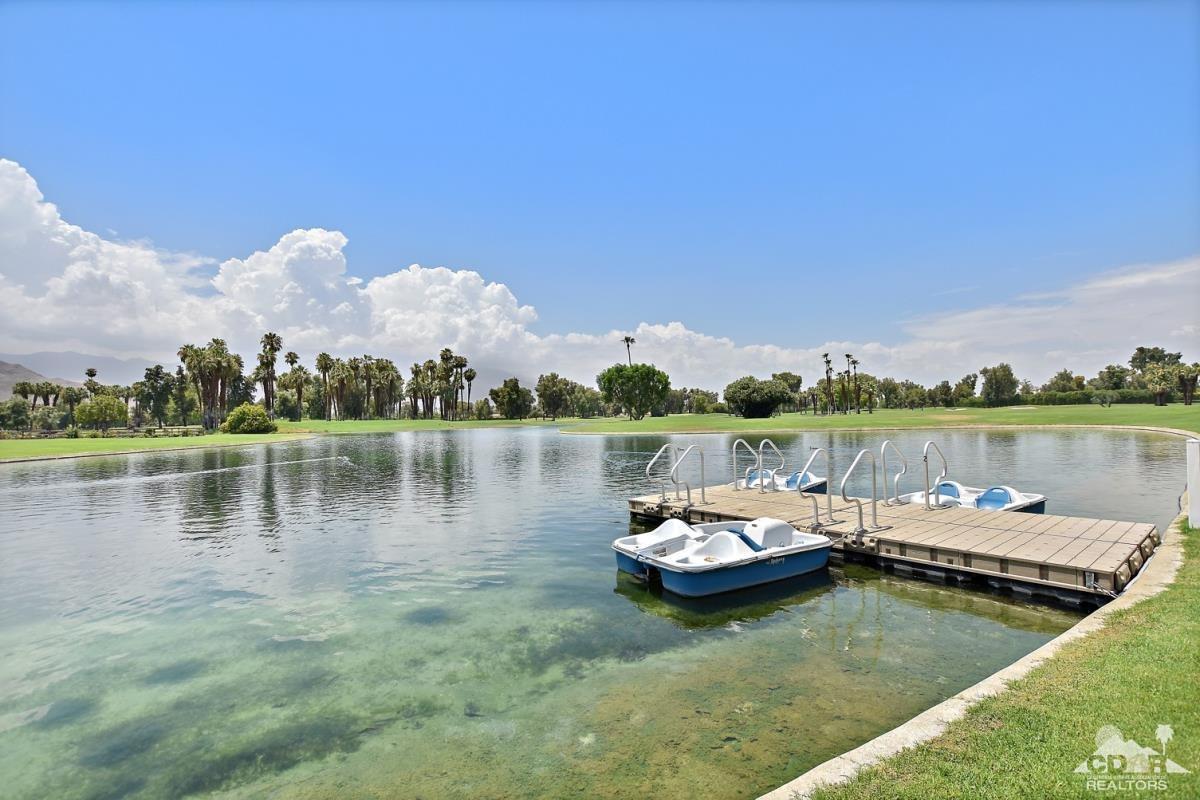 900 Island Drive, Unit 109 Rancho Mirage, CA 92270 - Photo 3 of 19 a view of a lake with boats