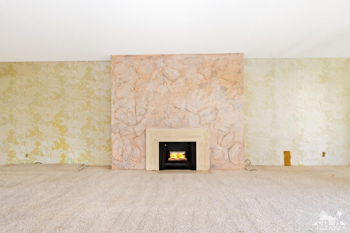 900 Island Drive, Unit 109 Rancho Mirage, CA 92270 - Photo 6 of 19 a building with a outdoor space