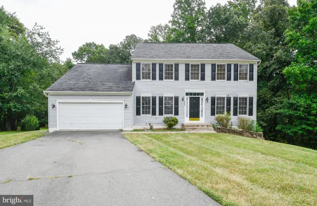 a house view with a garden space