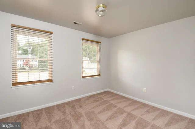 a view of a room with a window