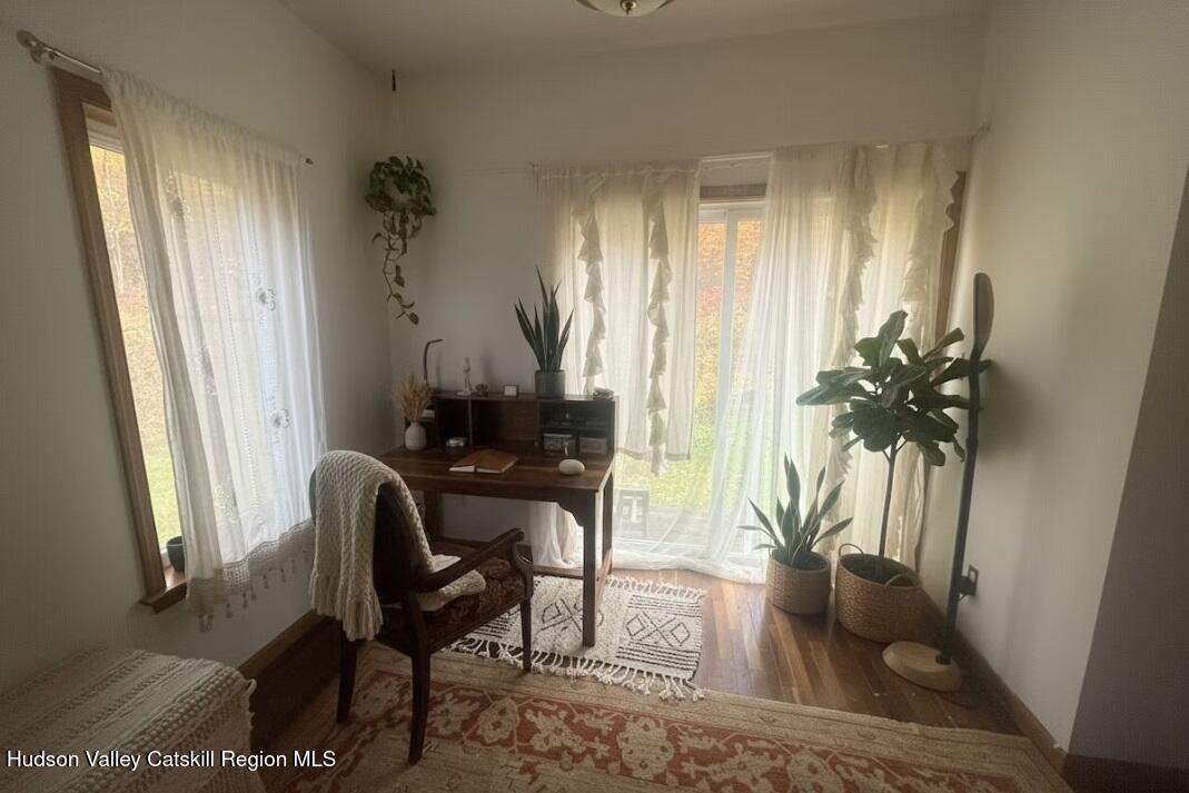 614 Salls Road New Lebanon, NY 12029 - Photo 18 of 22 a view of a workspace with furniture and a window