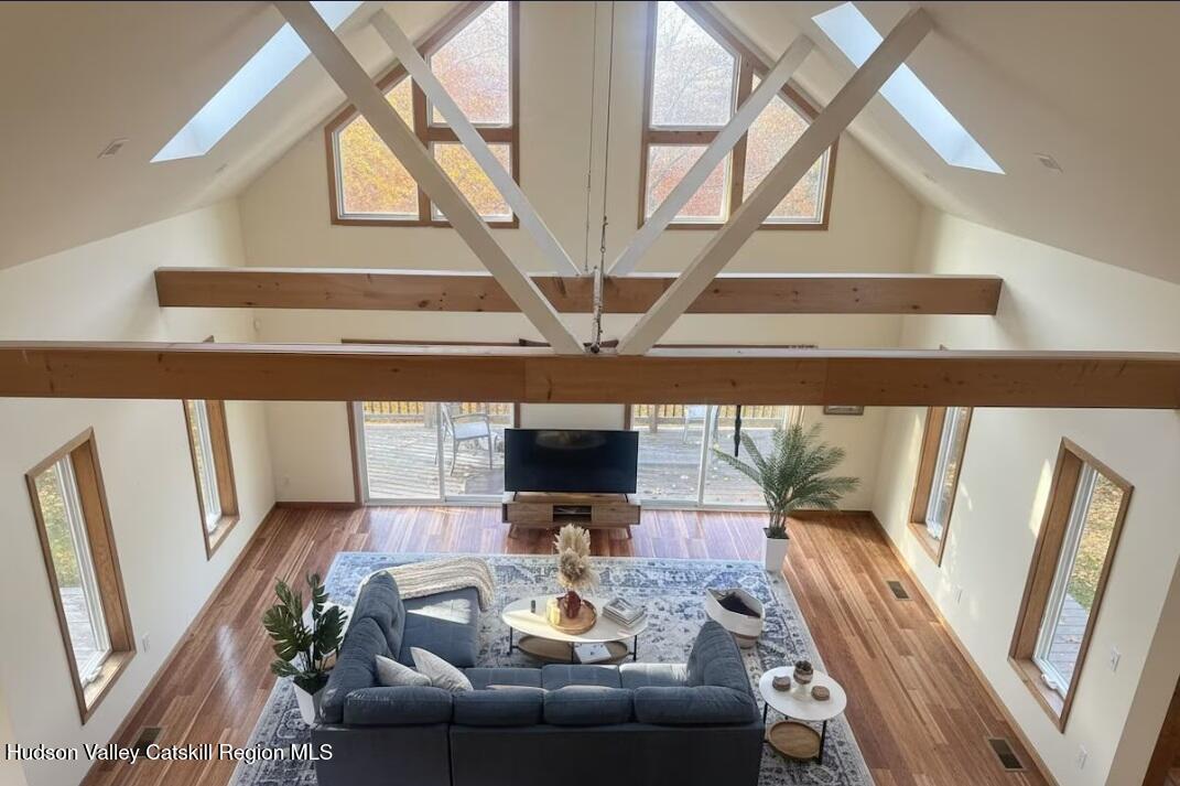614 Salls Road New Lebanon, NY 12029 - Photo 5 of 22 a view of living room with furniture and a floor to ceiling window