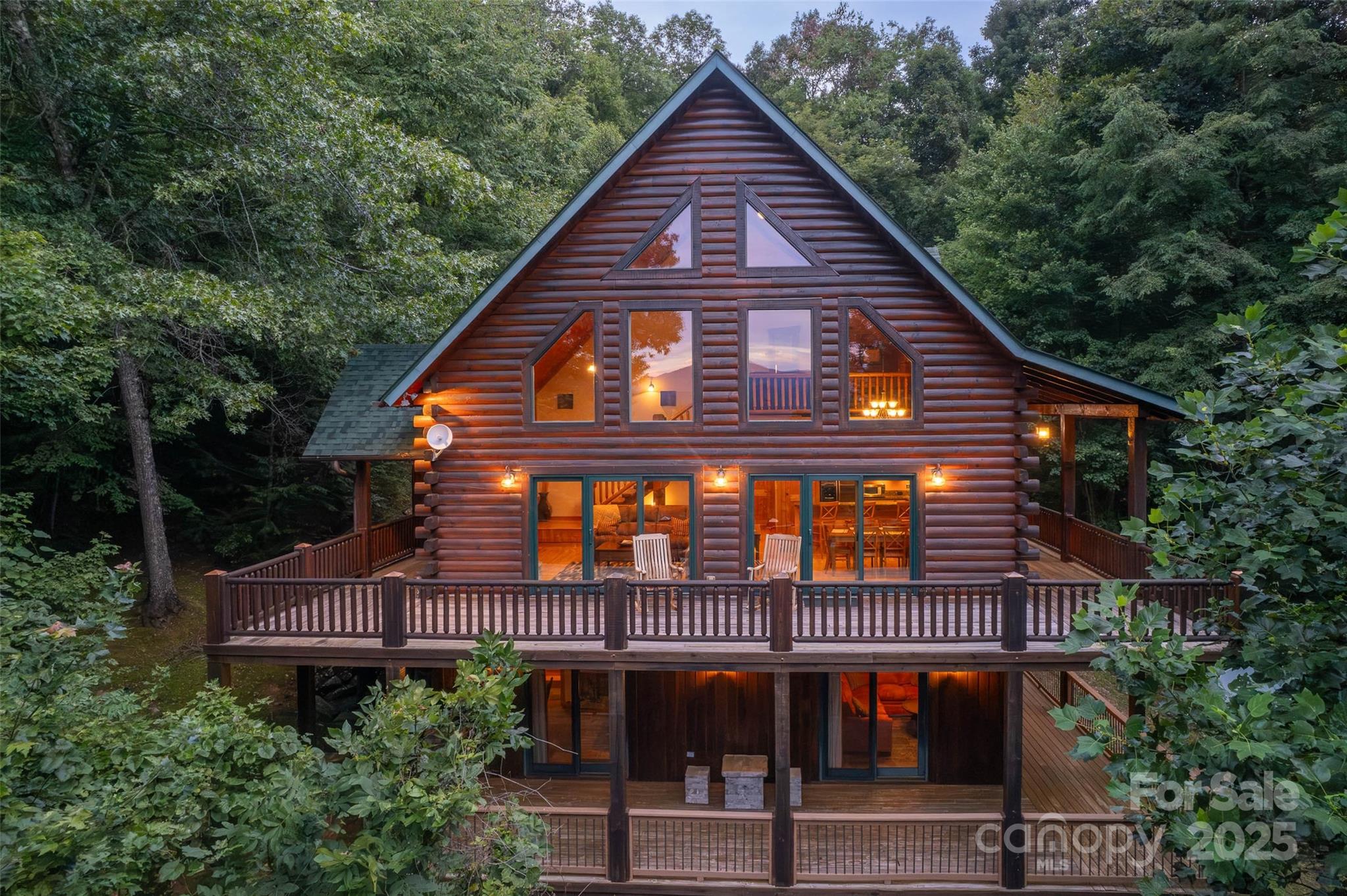a view of a house with balcony and garden