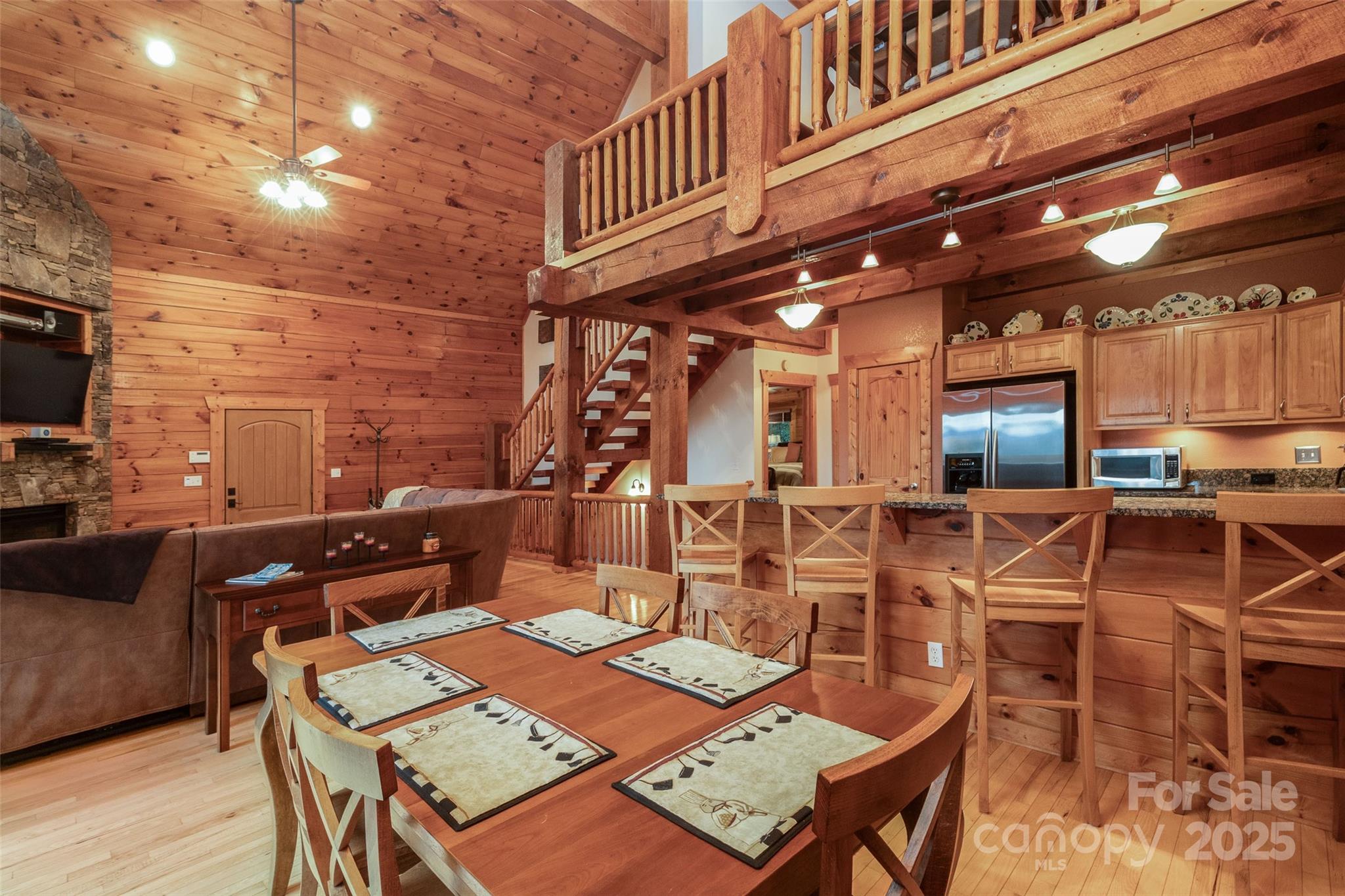 776 Still Branch Road Sylva, NC 28779 - Photo 13 of 43 a view of a patio with chairs and table