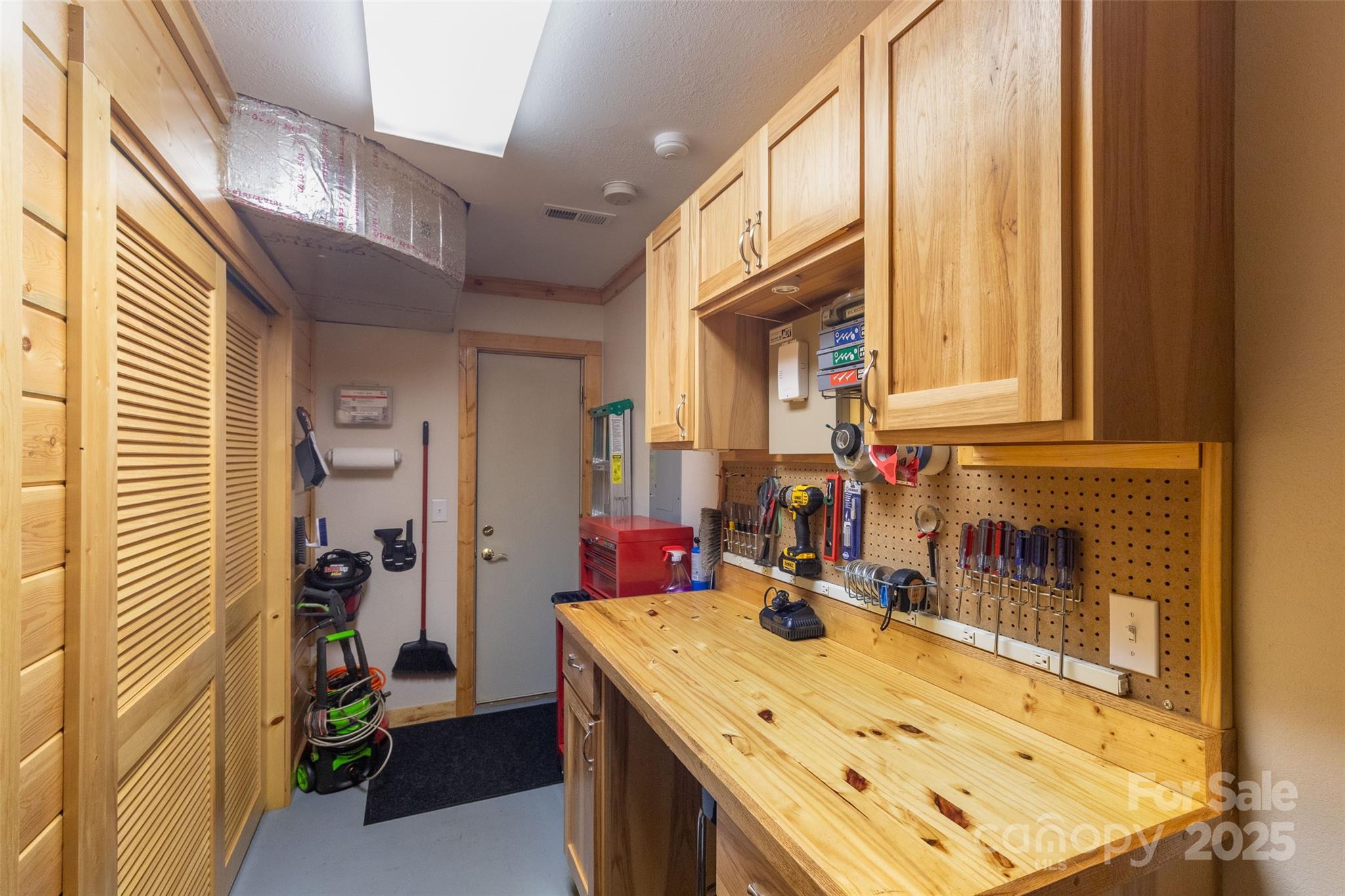 776 Still Branch Road Sylva, NC 28779 - Photo 32 of 43 a bathroom with a sink a vanity and a mirror