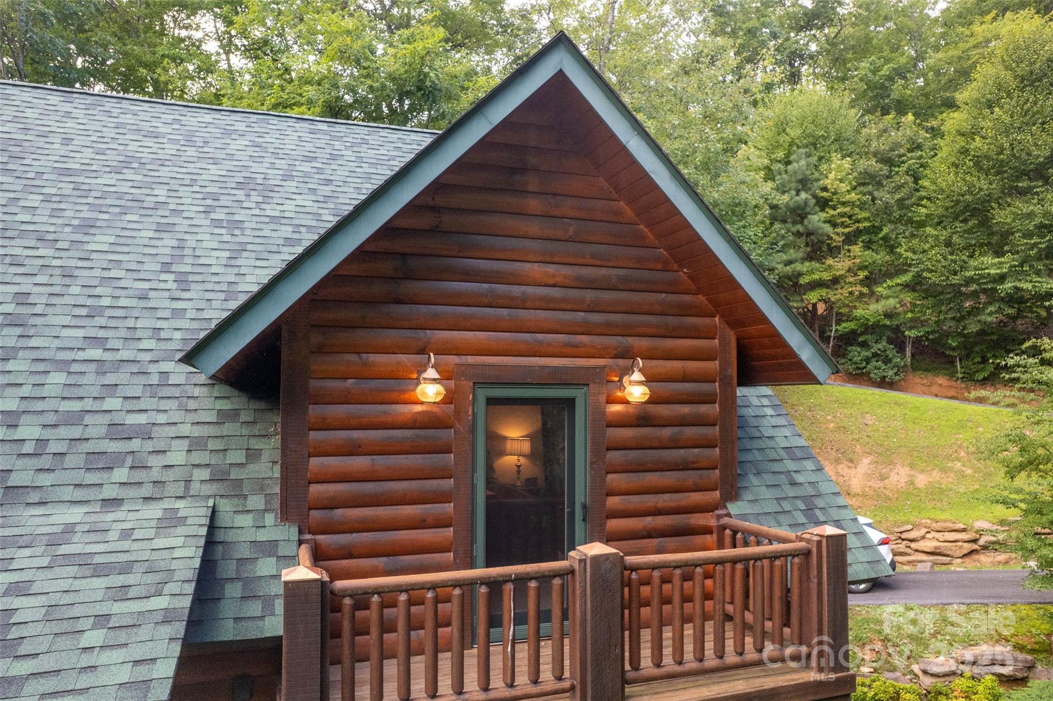 776 Still Branch Road Sylva, NC 28779 - Photo 33 of 43 a view of a house with a balcony