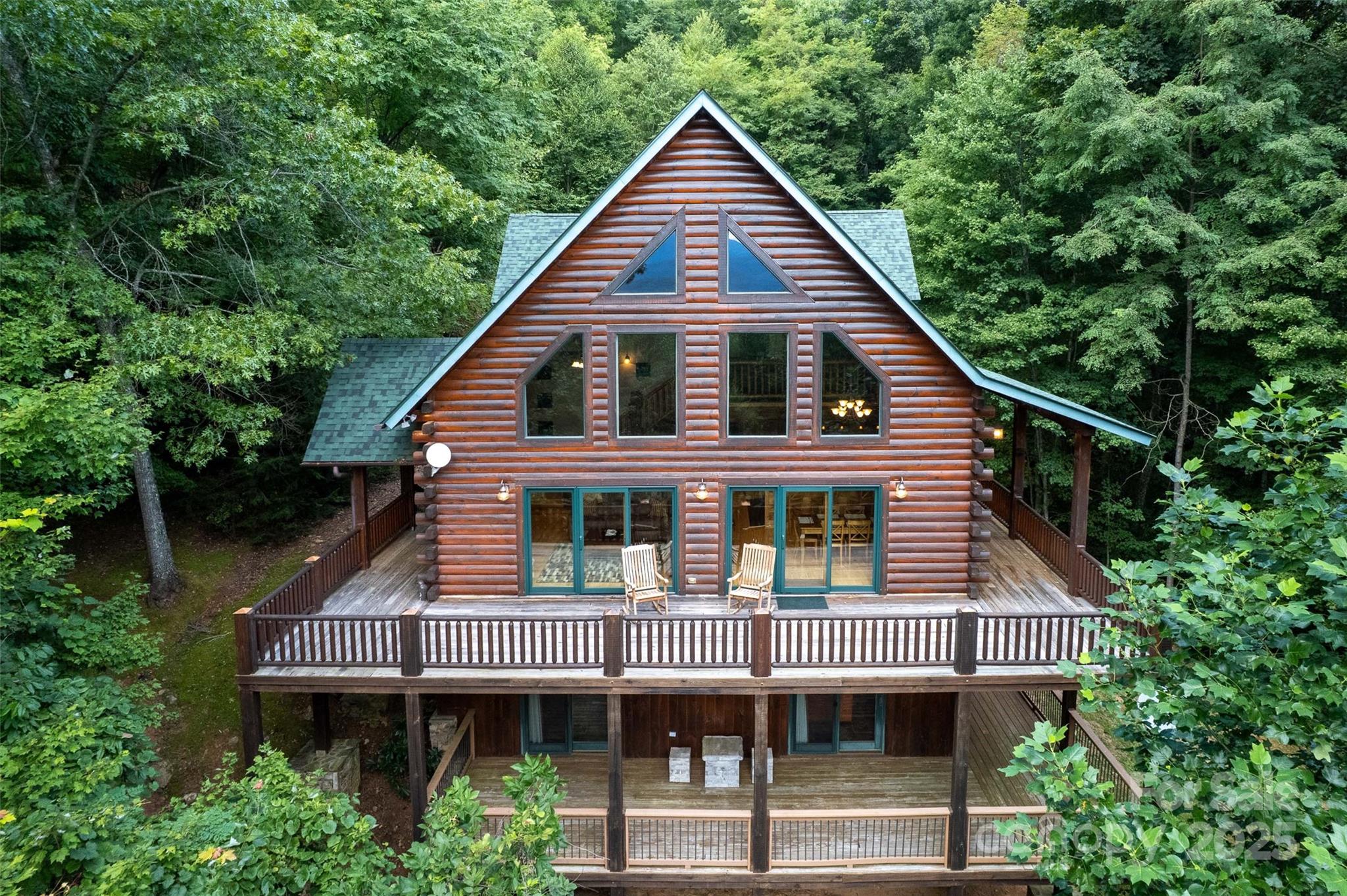 776 Still Branch Road Sylva, NC 28779 - Photo 43 of 43 a view of a house that has wooden deck